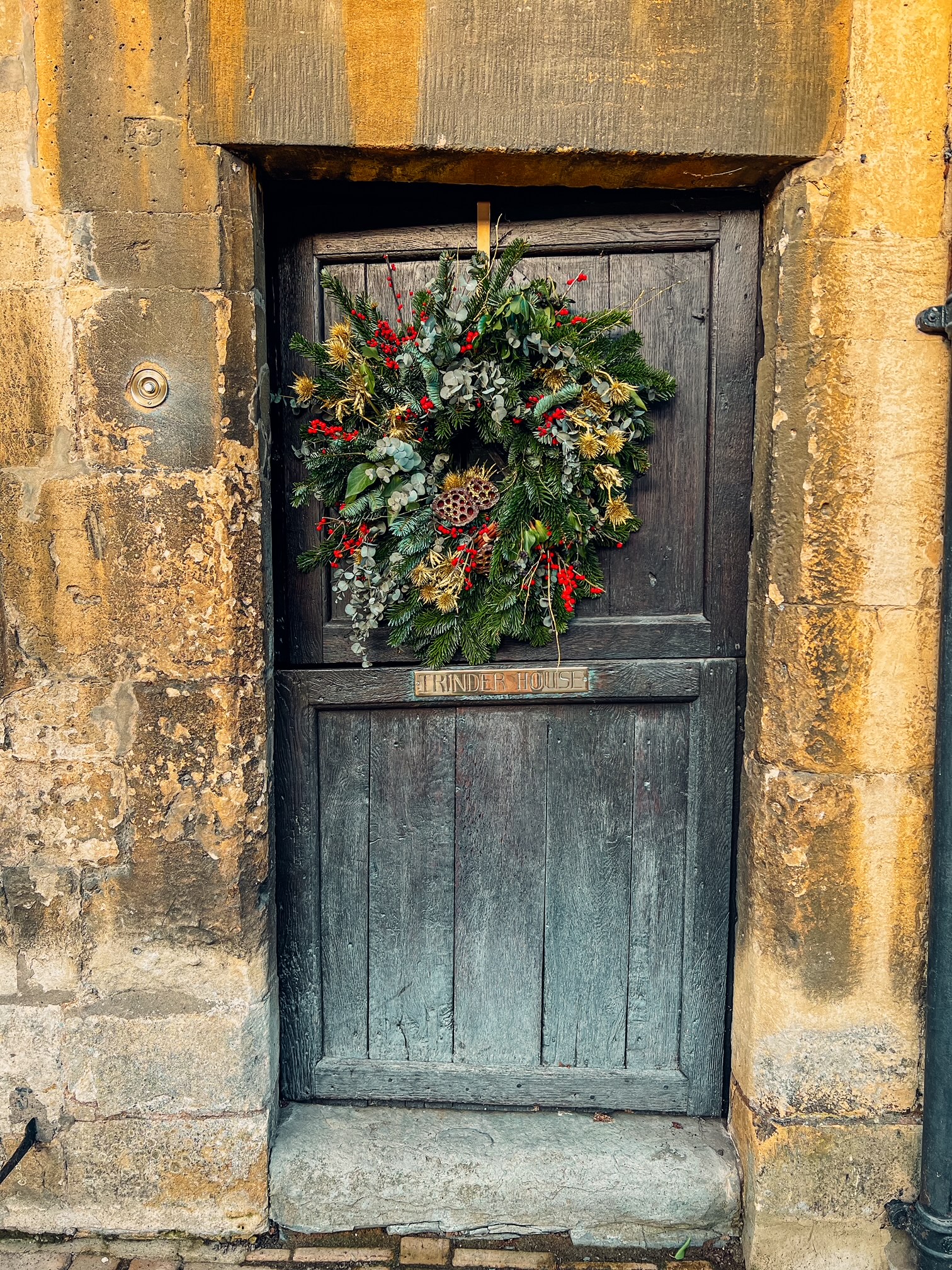 A wreath on a door at Christmas in the Cotswolds.