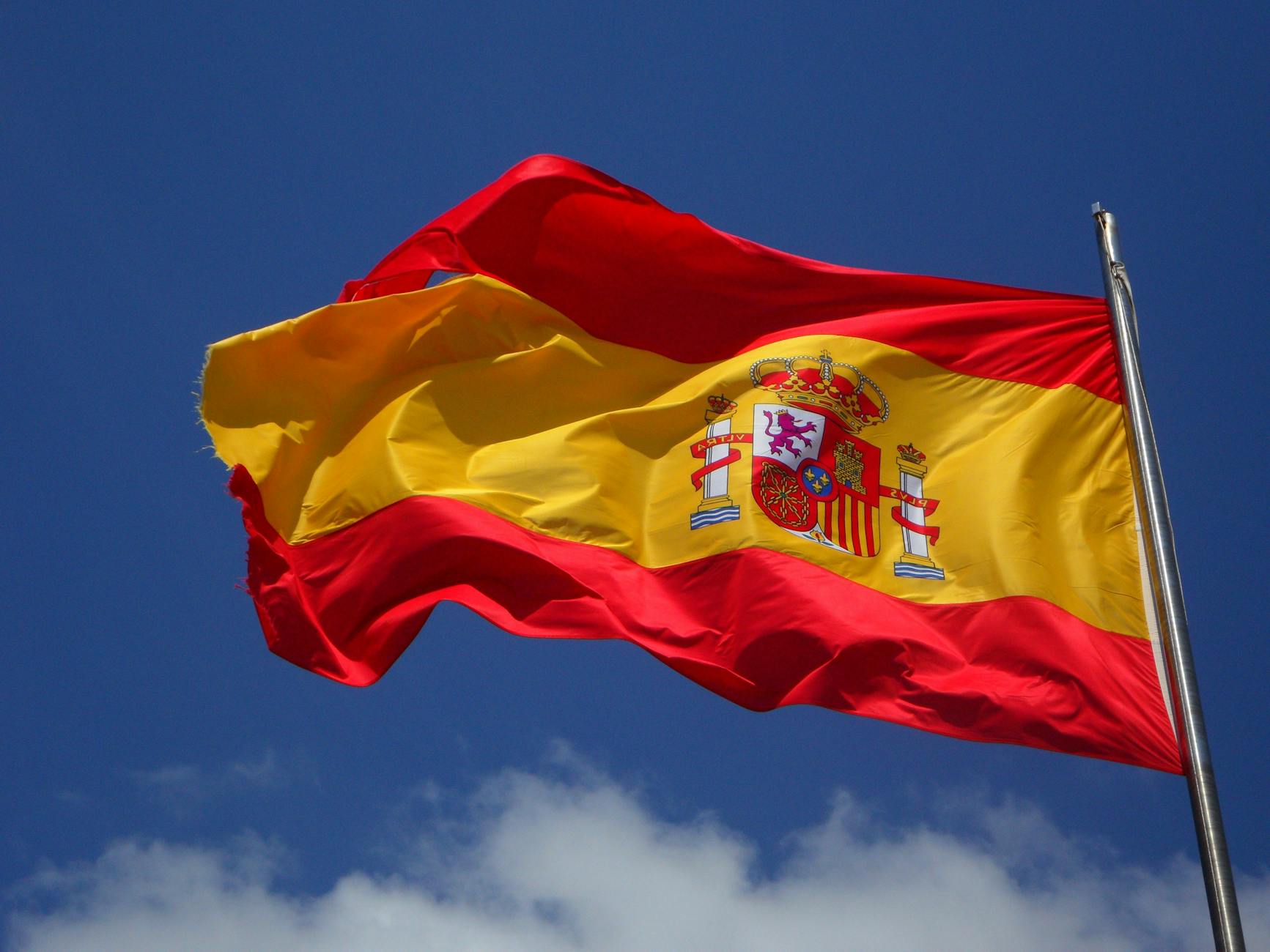 spain flag in pole. The Ultimate Basque Country Travel Guide
