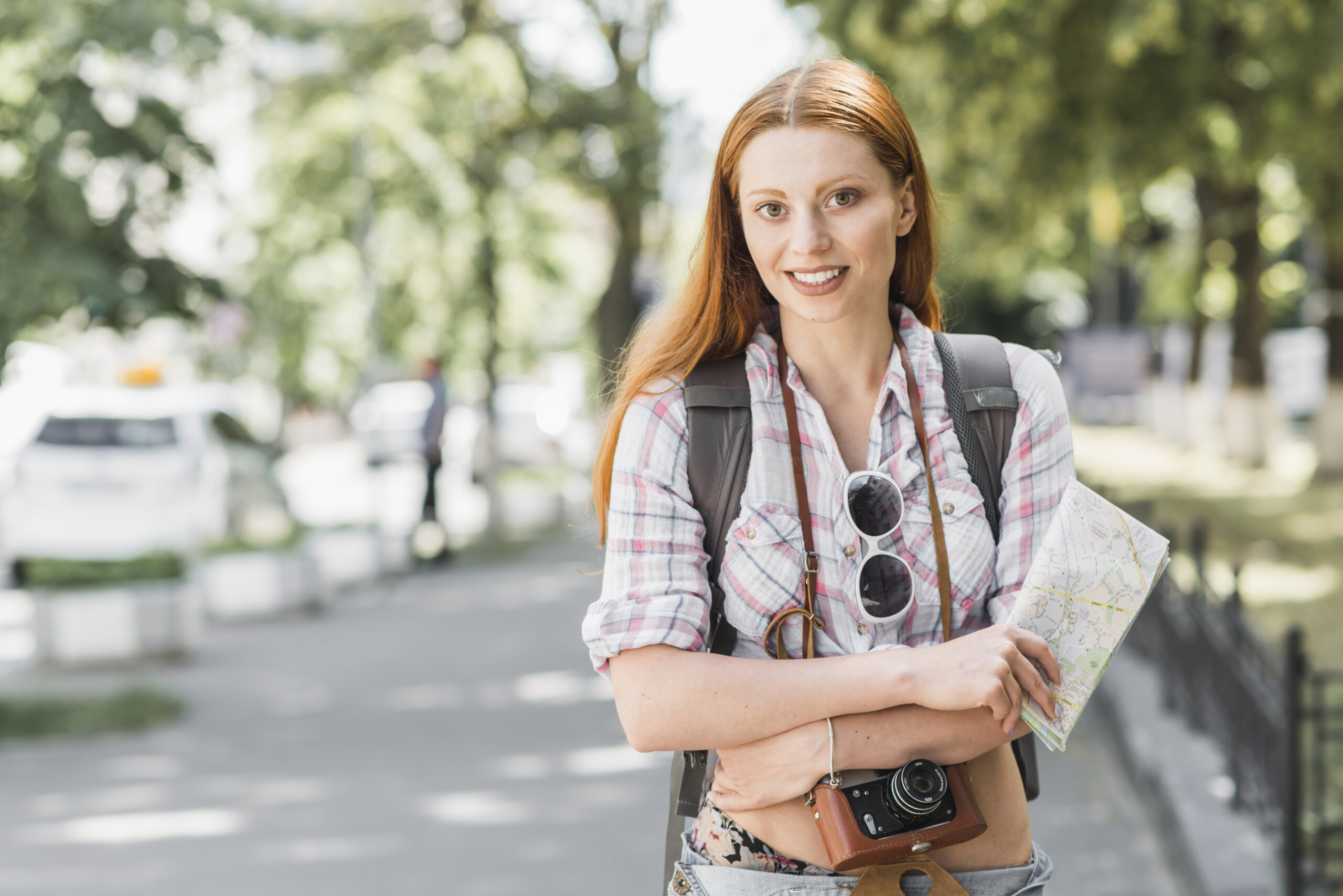 https://www.freepik.com/free-photo/woman-with-backpack-map-camera_2509504.htm